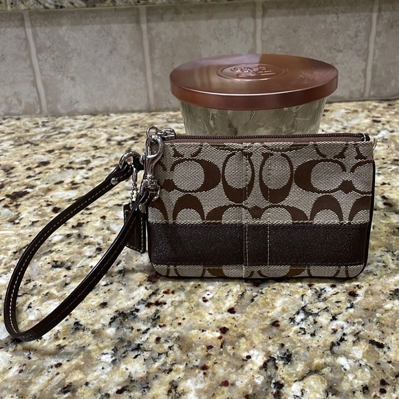 Coach Handbags - COACH brown and tan wristlet.  OS